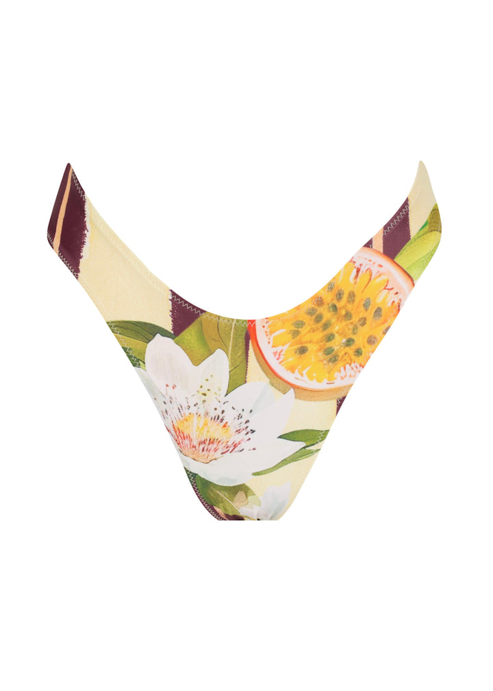 Front view of Passiontini Midi Bottoms in tropical passionfruit and floral print with yellow passionfruit halves, green leaves, and cream background with V‑shaping at the front.